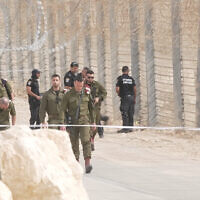 IDF chief Herzi Halevi walks with other military and police officials near the site where an Egyptian policeman infiltrated into Israel, June 3, 2023. (Israel Defense Forces)