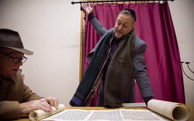 Rabbi Gilberto Ventura leads the Jewish community of Catania in a recent service. (David I. Klein/JTA)