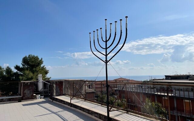 The rooftop of the Castello Leucatia, where the Jewish community of Catania meets, has a large menorah and a view of the Mediterranean. (David I. Klein/JTA)