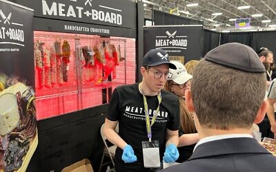 Meat and Board is one of many popular meat stalls at KosherPalooza. (Jackie Hajdenberg/ JTA)