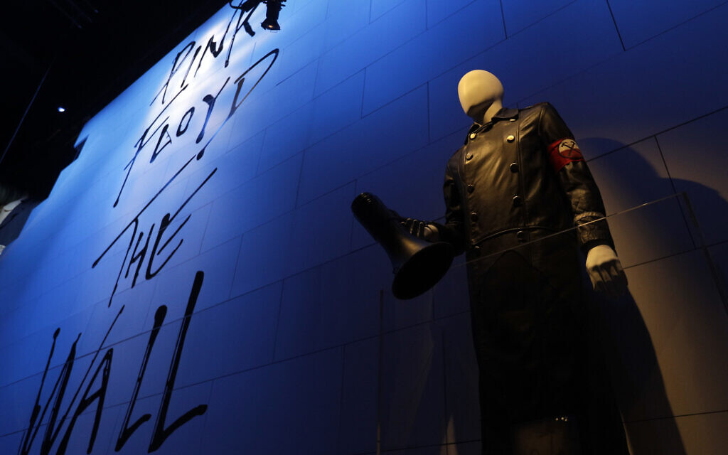 A mannequin holding a megaphone is displayed at 'The Pink Floyd Exhibition: Their Mortal Remains,' in Rome, January 16, 2018. (AP Photo/Gregorio Borgia)