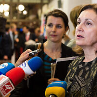 File: Then deputy prime minister of Bulgaria, Rumiana Bachvarova, right, speaks with the media prior to a meeting of EU justice and interior ministers at the EU Council building in Brussels on Monday, Sept. 14, 2015. (AP/Geert Vanden Wijngaert)