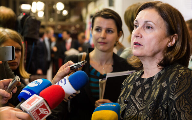 File: Then-deputy prime minister of Bulgaria, Rumiana Bachvarova, right, speaks with the media prior to a meeting of EU justice and interior ministers at the EU Council building in Brussels on Monday, September 14, 2015. (AP/Geert Vanden Wijngaert)