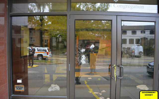 This photo of bullet damaged doors in the Tree of Life synagogue building in Pittsburgh was entered June 1, 2023, as a court exhibit by prosecutors in the federal trial of Robert Bowers. (US District Court for the Western District of Pennsylvania via AP)