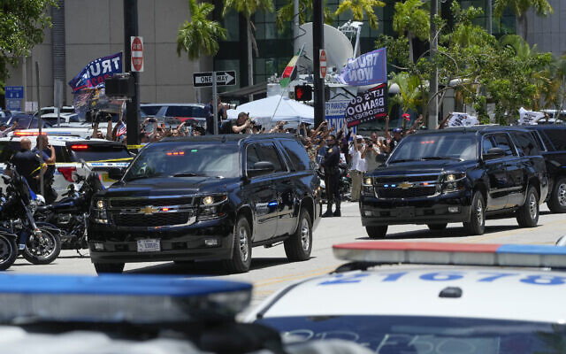 The motorcade carrying former US president Donald Trump arrives at the Wilkie D. Ferguson Jr. US Courthouse, June 13, 2023, in Miami. (AP/Marta Lavandier)