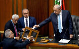 Lebanese Parliament Speaker Nabih Berri, right, casts his vote as parliament gathers to elect a president at the parliament building in downtown Beirut, Lebanon, June 14, 2023. (Hassan Ammar/AP)