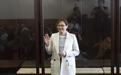 Lilia Chanysheva gestures as she is standing in a cage during a hearing in a courtroom of the Kirovskiy District Court in Ufa, Russia, June 14, 2023. (AP Photo)