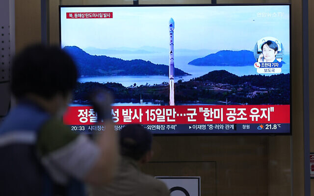 A TV screen shows a report of North Korea's missile launch with file image during a news program at the Seoul Railway Station in Seoul, South Korea, June 15, 2023.  (AP Photo/Lee Jin-man)