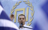 In this Friday, May 23, 2014 file photo, Ilias Kassidiaris, lawmaker of the extreme right party Golden Dawn speaks during the main election rally of the party. (AP Photo/Petros Giannakouris, File)