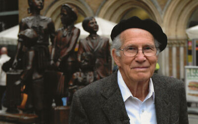 Ben Abeles, photographed in 2008 in front of the Kindertransport memorial at the Liverpool Street station in London, where the children arrived after boarding the train in Harwich. (Courtesy of Helen Abeles)