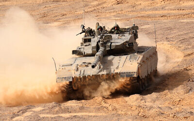 Israeli soldiers take part in an army drill with Merkava Mark 3 tanks, January 22, 2013. (Ofer Zidon/FLASH90, file)
