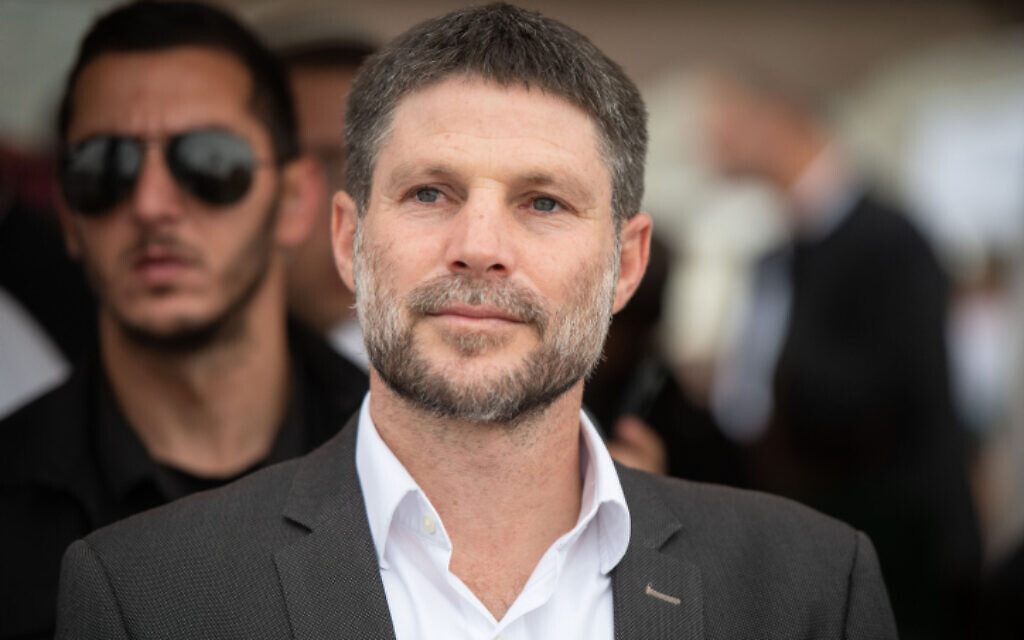 Finance Minister Bezalel Smotrich takes part in a march to the illegal West Bank outpost of Evyatar, near the West Bank city of Nablus, during the Passover holiday, April 10, 2023. (Sraya Diamant/ Flash90/ File)