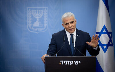 Head of the Yesh Atid party MK Yair Lapid speaks during a faction meeting at the Knesset on June 5, 2023. (Yonatan Sindel/ Flash90)