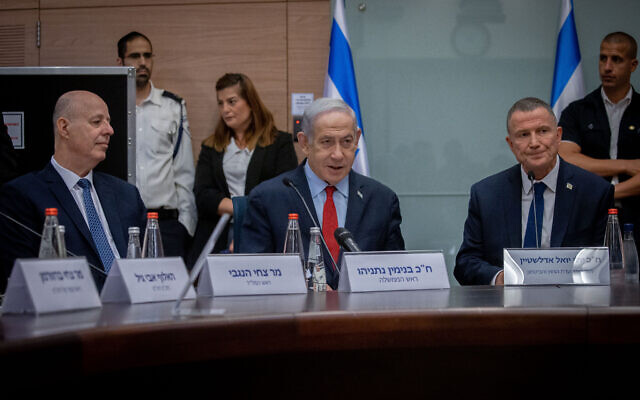 Prime Minister Benjamin Netanyahu, center, attends a Knesset Foreign Affairs and Defense Committee meeting at the Knesset, on June 13, 2023. (Oren Ben Hakoon/Flash90)