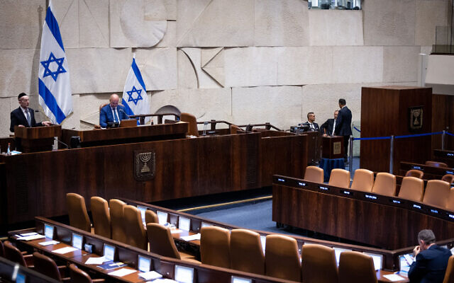 View of the almost empty assembly hall of the Knesset in Jerusalem, June 14, 2023. (Yonatan Sindel/Flash90)