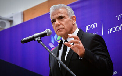 Opposition leader Yair Lapid speaks at Reichman University in Herzliya on June 15, 2023. (Avshalom Sassoni/Flash90)
