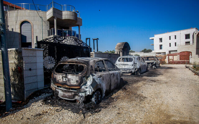 Damage caused to Palestinian homes and cars by Jewish extremists in the West Bank village of Turmus Ayya, on June 21, 2023 (Nasser Ishtayeh/Flash90)