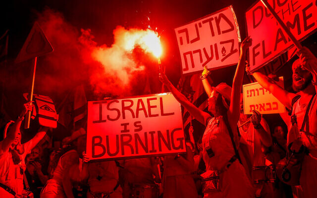 Israelis protest against the judicial overhaul in Tel Aviv, June 24, 2023. (Miriam Alster/Flash90)