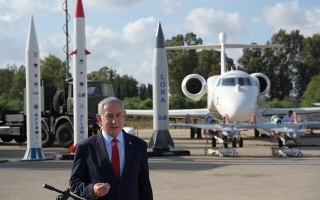 In this handout photo, Prime Minister Benjamin Netanyahu tours Israel Aerospace Industries headquarters, June 18, 2023. (Amos Ben Gershom/GPO)