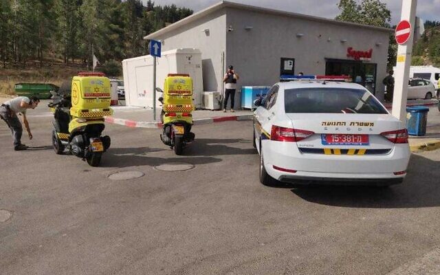 First responders at the scene of a shooting attack at a gas station near the West Bank settlement of Eli on June 20, 2023. (Magen David Adom)