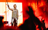 UK pop star Robbie Williams performs in Tel Aviv at Yarkon Park on June 1, 2023.  (Courtesy Guy Sidi)