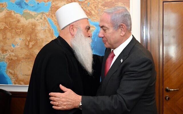 Prime Minister Benjamin Netanyahu meets with Druze spiritual leader Sheikh Moafaq Tarif in his office in Jerusalem on June 21, 2023. (Haim Zach/GPO)