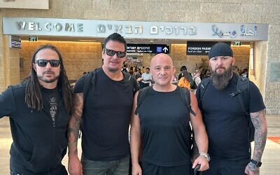 Members of heavy metal band Disturbed from Chicago, arriving at Ben Gurion International Airport, and will perform June 28, 2023 at Expo Tel Aviv (Courtesy PR)