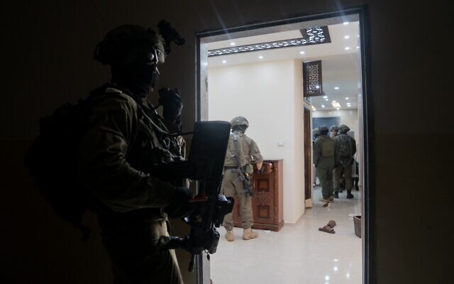 Troops map the home of Moaz al-Masri, the Hamas terrorist who killed 3 members of the Dee family in a West Bank shooting, on June 13, 2023 (Israel Defense Forces)