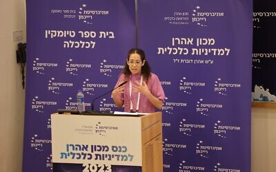 Outgoing Finance Ministry chief economist Shira Greenberg speaks at the Aaron Institute for Economic Policy conference at Reichman University, June 14, 2023. (Oren Shalev)