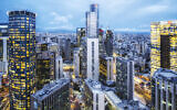 Illustrative: Skyscrapers in Tel Aviv. March 2023. (Anna Arinshtein via iStock by Getty Images)