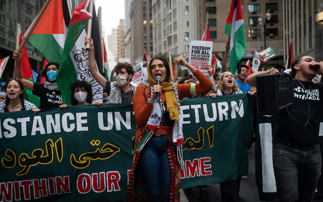 Pro-Palestinian activists led by Nerdeen Kiswani hold a 'Globalize the Intifada' protest against Israel and in support of Palestinian security prisoners in New York City, September 17, 2021. (Luke Tress/Flash90)