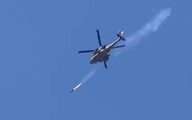 An IDF Apache helicopter is seen launching missiles in the northern West Bank city of Jenin, June 19, 2023. (Social media: Used in accordance with Clause 27a of the Copyright Law)