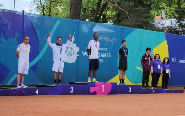 Israeli tennis player Nadav Sarfati wins a silver medal at the Special Olympics in Berlin on June 24, 2023. (Courtesy)