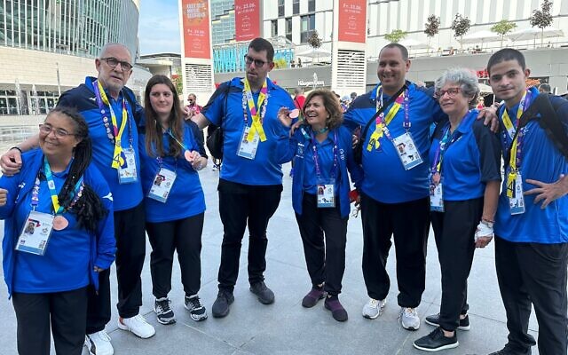 Israel's Special Olympics 'Unified' bowling athletes with their medals and ribbons in Berlin on June 21, 2023. (Courtesy)