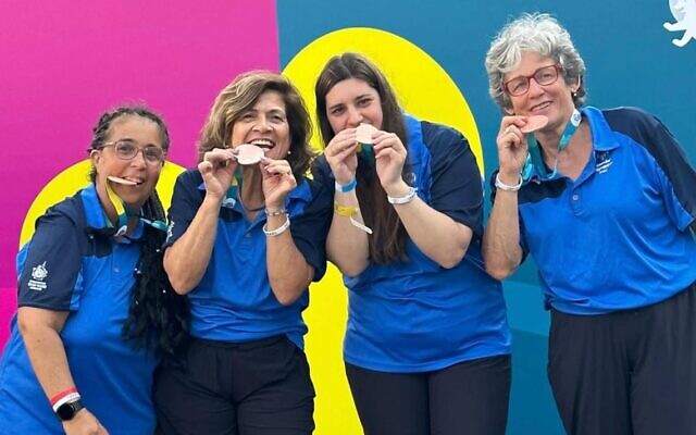 The Israeli Special Olympics 'Unified' bowling team with their bronze medals at the Berlin games, June 21, 2023: (from left) Rivi Cohen, Hana Duanis, Danielle Wieksza and Shlomit Meron. (Courtesy)