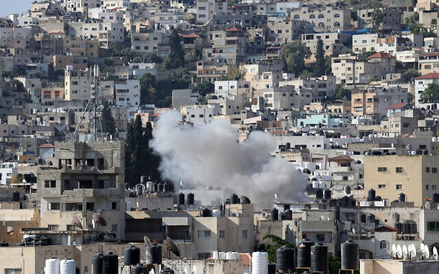 Smoke billows following an Israeli airstrike in the West Bank city of Jenin on July 3, 2023 (Jaafar ASHTIYEH / AFP)