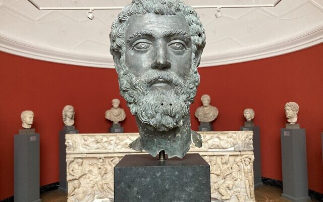 This photo, taken on June 29, 2023, shows a bronze head of Roman Emperor Septimius Severus (145 AD-211 CE), Asia Minor, ca 195-211, displayed at the Ny Carlsberg Glyptotek museum in Copenhagen. (Camille BAS-WOHLERT / AFP)