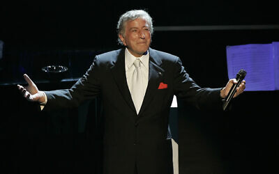 Tony Bennett reacts after performing the song "I left My Heart in San Francisco" during his 80th birthday celebration at the Kodak Theater in Los Angeles, on Nov. 9, 2006. (AP Photo/Kevork Djansezian, File)