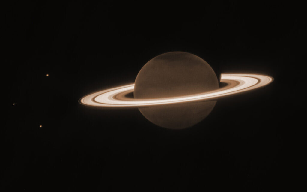 world News  Saturn’s rings glow bright in Webb Space Telescope’s latest cosmic shot