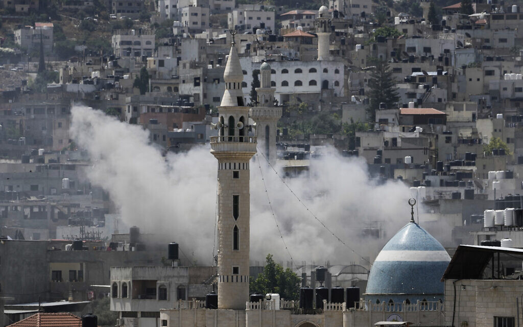 Smoke rises during an Israeli military raid in Jenin on Monday, July 3, 2023. (AP Photo/Majdi Mohammed)