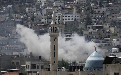 Smoke rises during an Israeli military raid in Jenin on Monday, July 3, 2023. (AP Photo/Majdi Mohammed)