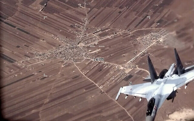 In this image from video released by the US Air Force, a Russian SU-35 flies near a US Air Force MQ-9 Reaper drone on July 5, 2023, over Syria. (U.S. Air Force via AP)