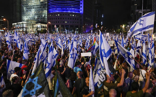 Israelis protest against plans by Prime Minister Benjamin Netanyahu's government to overhaul the judicial system, in Tel Aviv, July 8, 2023. (AP Photo/Ohad Zwigenberg)