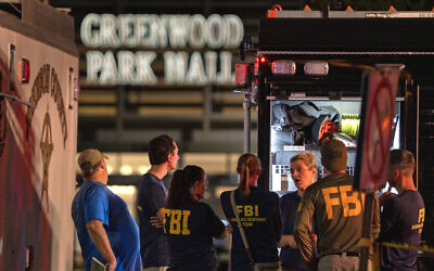 FBI agents gather at the scene of a deadly shooting, July 17, 2022, at the Greenwood Park Mall in Greenwood, Indiana. (Kelly Wilkinson/The Indianapolis Star via AP, File)