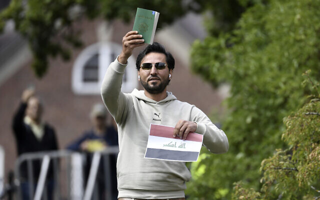 Protestor Salwan Momika appears outside the Iraqi embassy in Stockholm, Thursday, July 20, 2023, where he burned a copy of the Quran and the Iraqi flag. (Oscar Olsson/TT via AP)