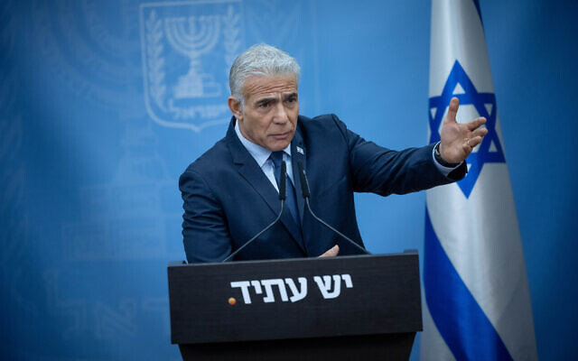 Opposition leader Yesh Atid chief MK Yair Lapid speaks during a faction meeting at the Knesset, in Jerusalem, on June 26, 2023. (Yonatan Sindel/Flash90)