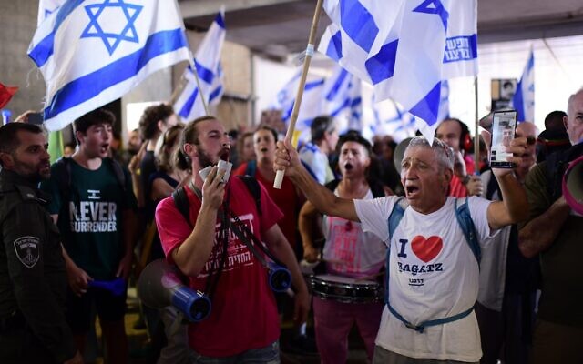 Israelis protest and clash with police during a protest against the Israeli government's planned judicial overhaul, at the Ben Gurion Airport near Tel Aviv, July 3, 2023. (Tomer Neuberg/Flash90)