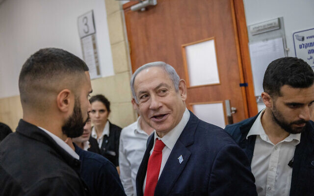 Prime Minister Benjamin Netanyahu seen at the Jerusalem District Court for the testimony in his corruption trial of businessman Arnon Milchan's, July 6, 2023. (Chaim Goldberg/Flash90)