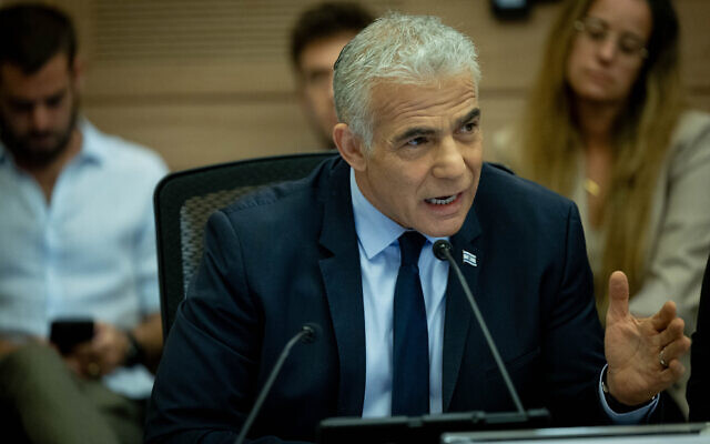 Opposition leader Yair Lapid speaks at a hearing of the Knesset Law and Justice Committee on the 'reasonableness' bill, July 11, 2023. (Yonatan Sindel/Flash90)