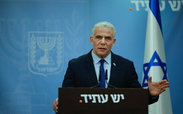 Head of the Yesh Atid party MK Yair Lapid speaks during a faction meeting at the Knesset in Jerusalem, on July 17, 2023. (Chaim Goldberg/Flash90)